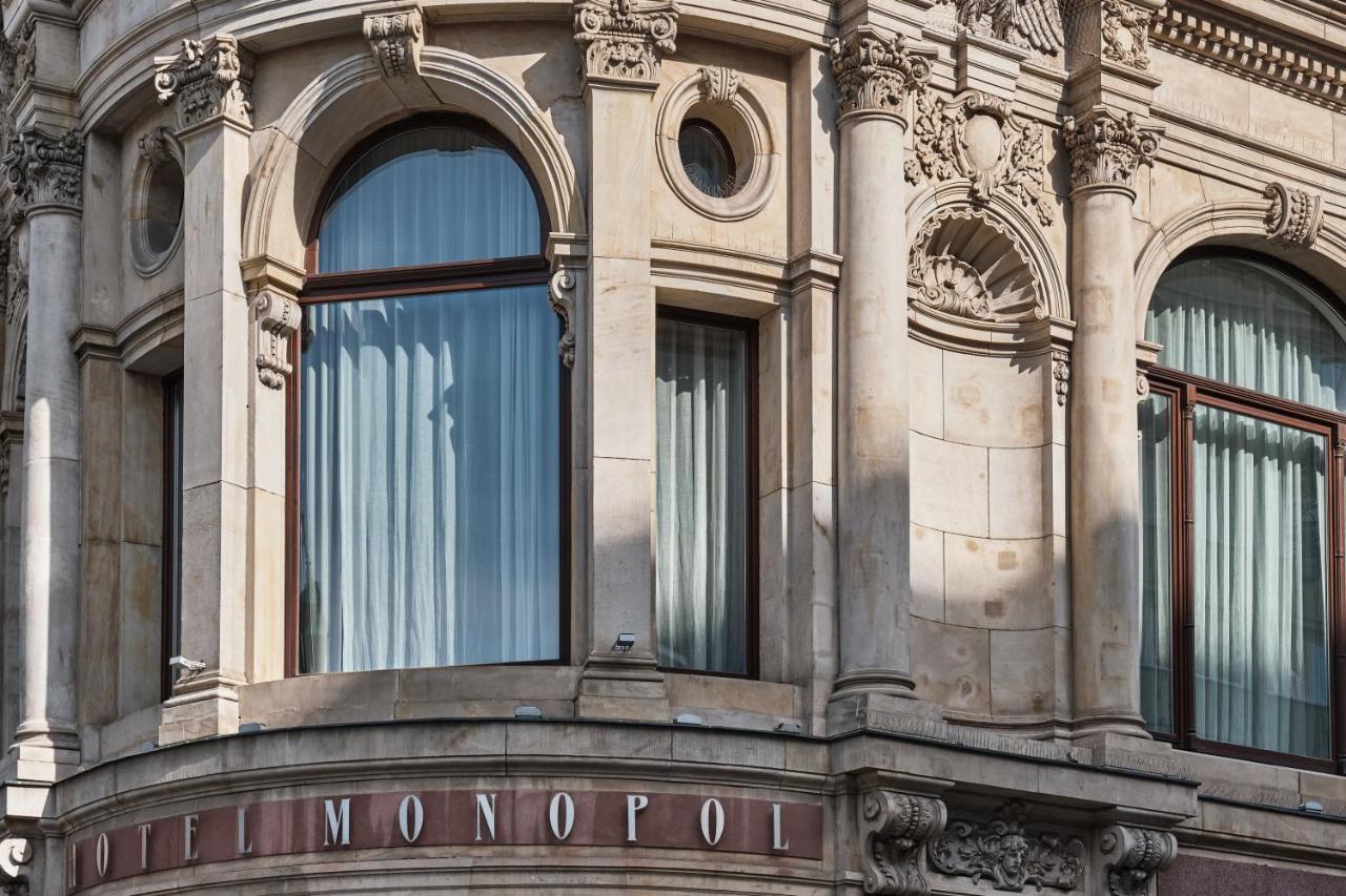 Hotel Monopol Breslávia Exterior foto The hotel's name on the front of the building